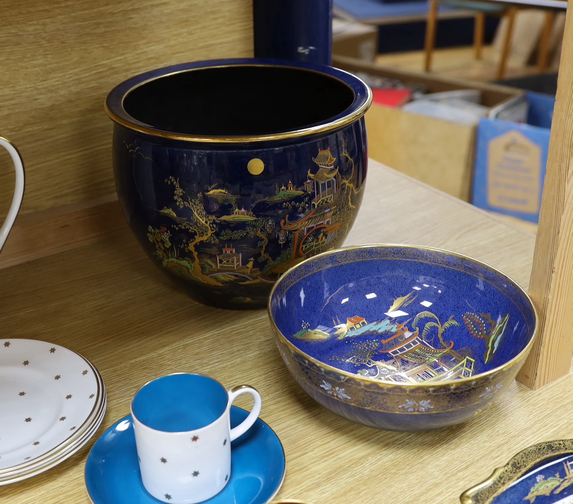 A Carlton ware powder blue jardiniere, similar bowl and oval dish with Oriental design together with a Susie Cooper part tea and coffee set, largest 19cm high